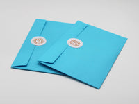 Fotomagnet verpackt in einem umweltfreundlichen Papierumschlag – sichere & stilvolle Geschenkverpackung